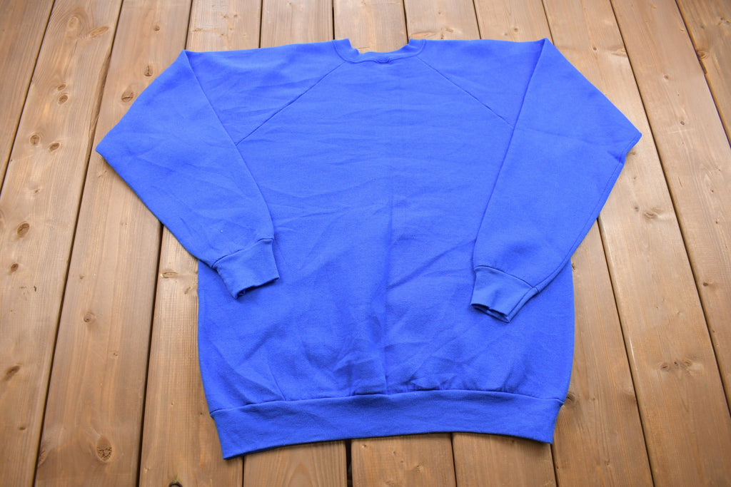 Vintage 1990s fruit of the Loom Blank Raglan Crewneck Sweatshirt