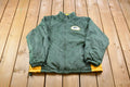Vintage 1990s Green Bay Packers Logo Fleece Lined Convertible Jacket