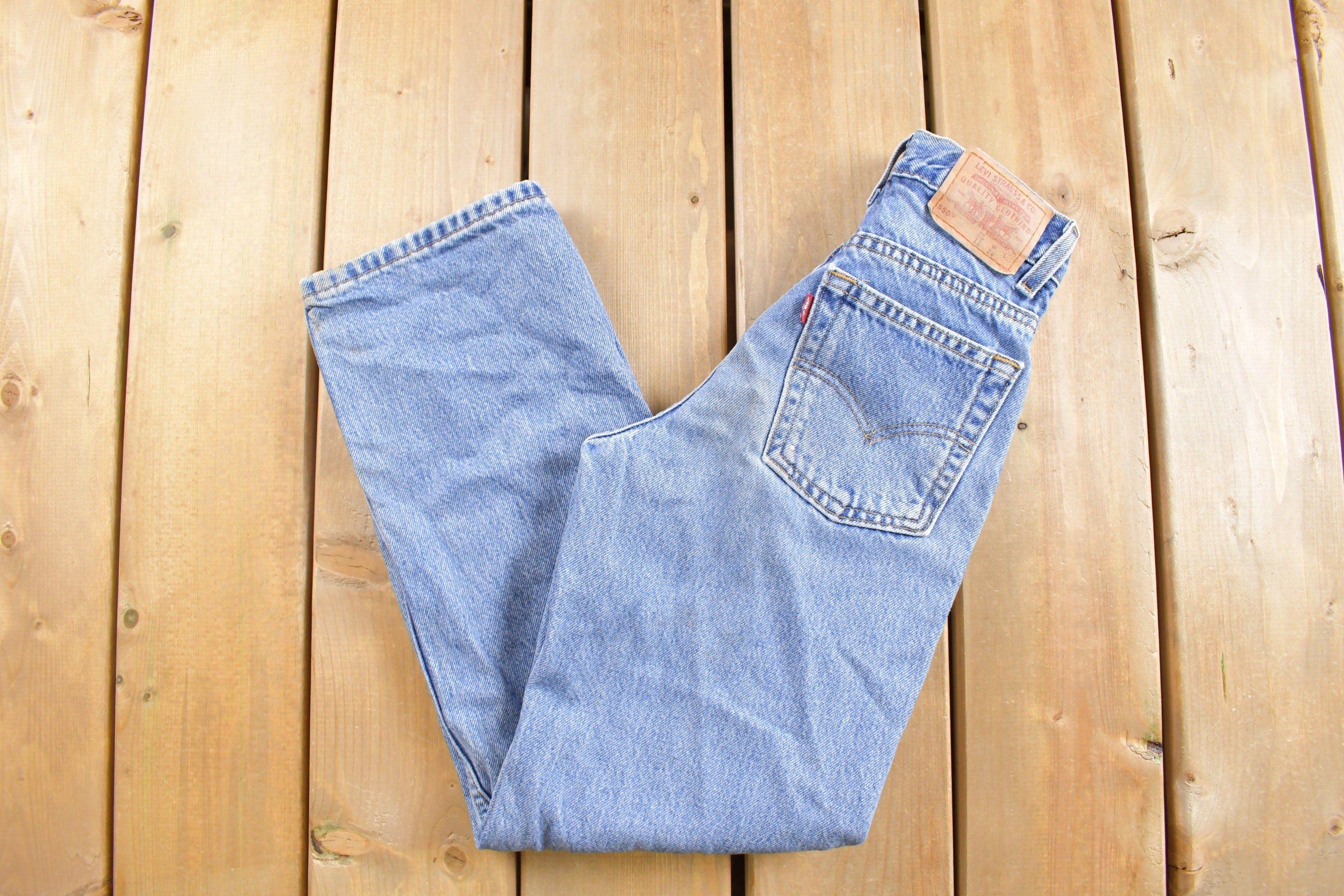 Vintage 1990s Levi's 550 Red Tab Denim Jeans Size 24 x 25
