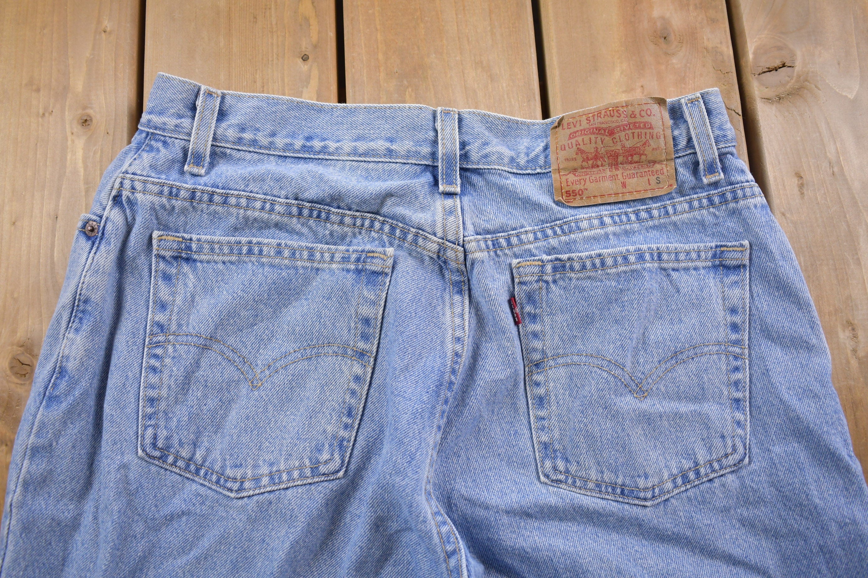 Vintage 1990s Levi's 550 Red Tab Jeans Size 32 x 28