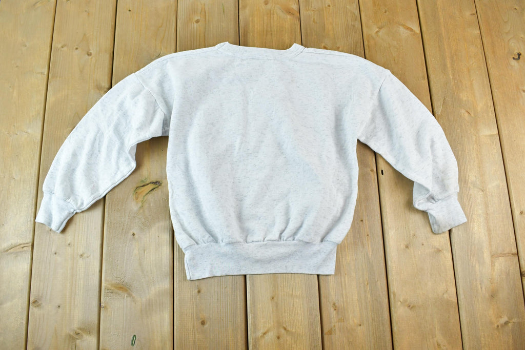 Vintage 1990s Chicago Blackhawks Youth NHL Graphic Sweater