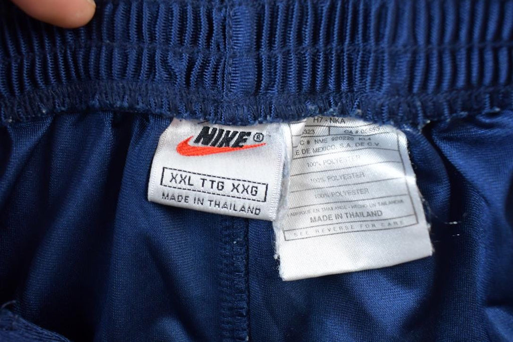 Vintage 1990s Nike Mini Swoosh Tearaway Click Button Track Pants
