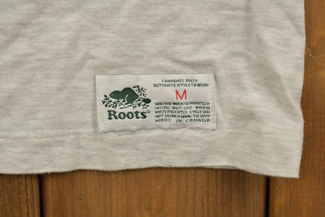 Vintage 1990s Roots Canada Graphic T-Shirt