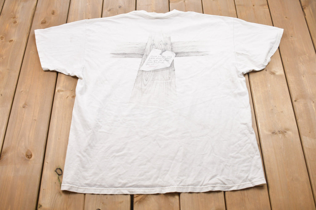 Vintage 1993 Jesus Loves Us Graphic T-Shirt