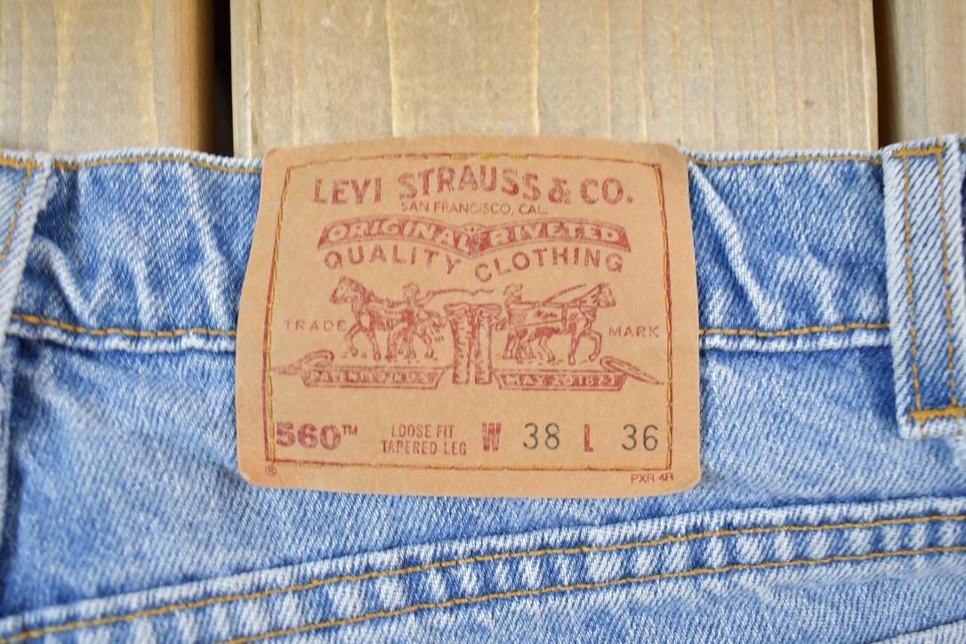Vintage 1990s Levi Strauss Red Tab 560 Loose Fit Denim Jeans Size 38 x 36