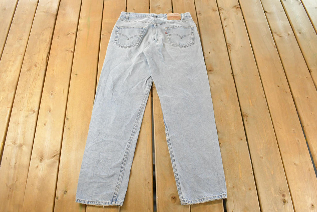 Vintage 1990s Levi's Distressed 550 Relaxed Fit Denim Jeans Men's 33 x 33 / 90s Levi's / Blown Out Sun Faded Jeans