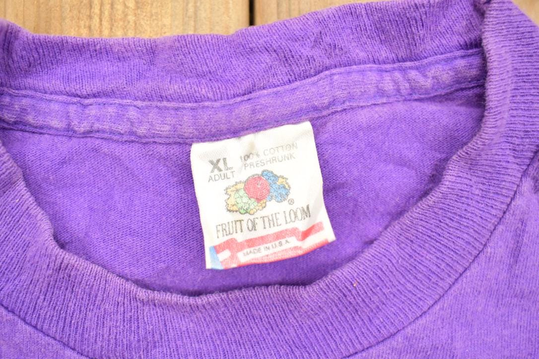 Vintage 1990s Fruit of The Loom Monster Smash '95 Travel T Shirt Made In USA Single Stitch
