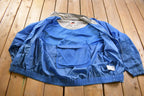 Vintage 1990s Nike Embroidered Mini Swoosh Windbreaker Jacket