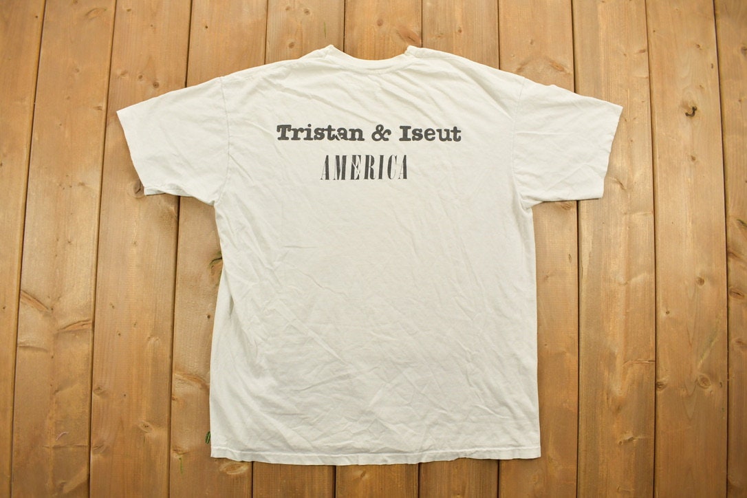 Vintage 1990s Tristan & Iseut America Graphic T-Shirt  Streetwear  Single Stitch  90s Graphic Tee  Sale Shirt