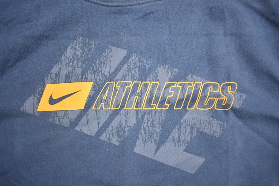 Vintage 1990s Nike Athletics Mini Swoosh Crewneck Sweatshirt