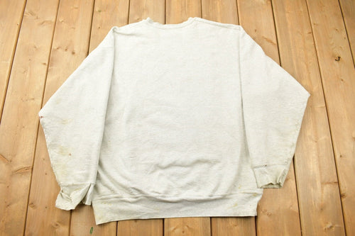 Vintage 1990s Thrashed Richfield University Collegiate Crewneck