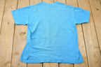 Vintage 1990 Looney Tunes Tasmanian Devil Taz Knows Sports Cartoon Promo T-Shirt