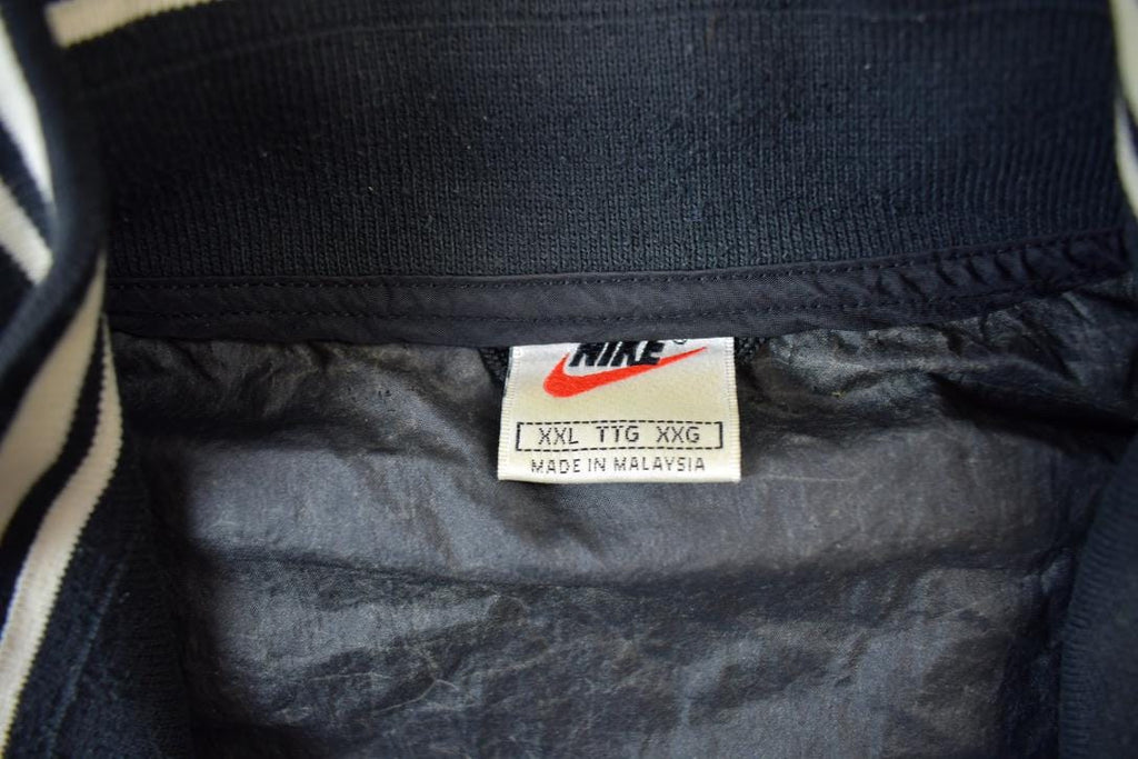Vintage 1990s Nike Red Tab Back Spellout Windbreaker Jacket - XXL