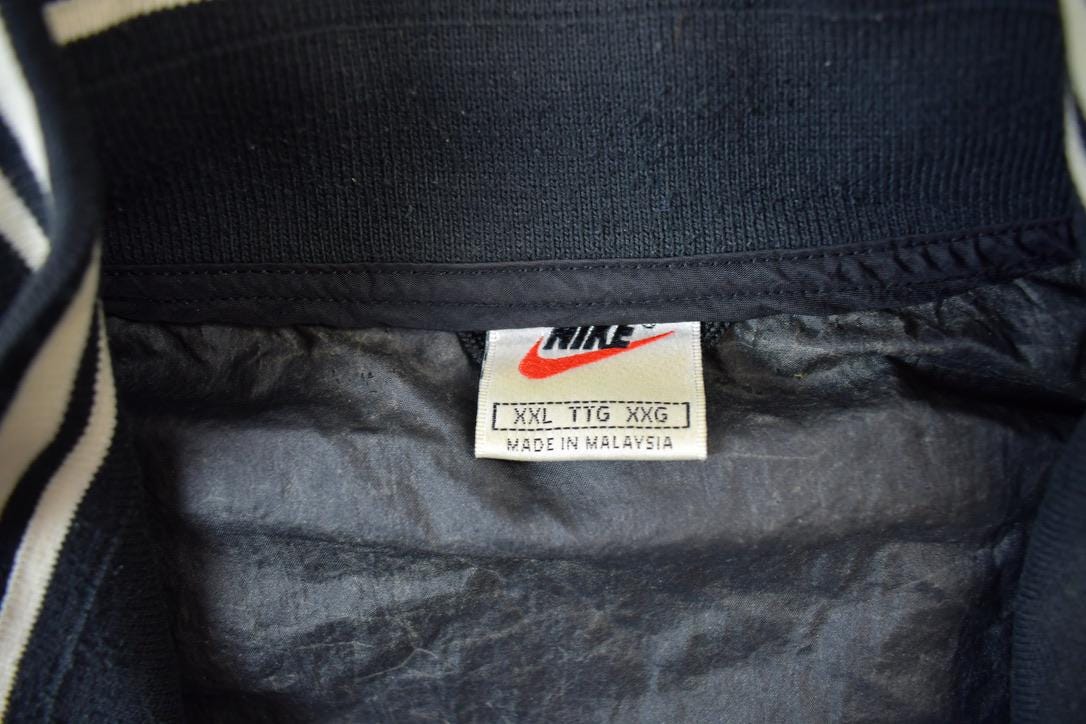 Vintage 1990s Nike Red Tab Back Spellout Windbreaker Jacket - XXL