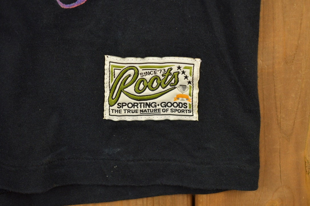 Vintage 1990s Roots Canada Graphic T-Shirt