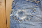 Vintage 1990s Levi's 550 Relaxed Fit Medium Wash Jeans Size 34 x 30