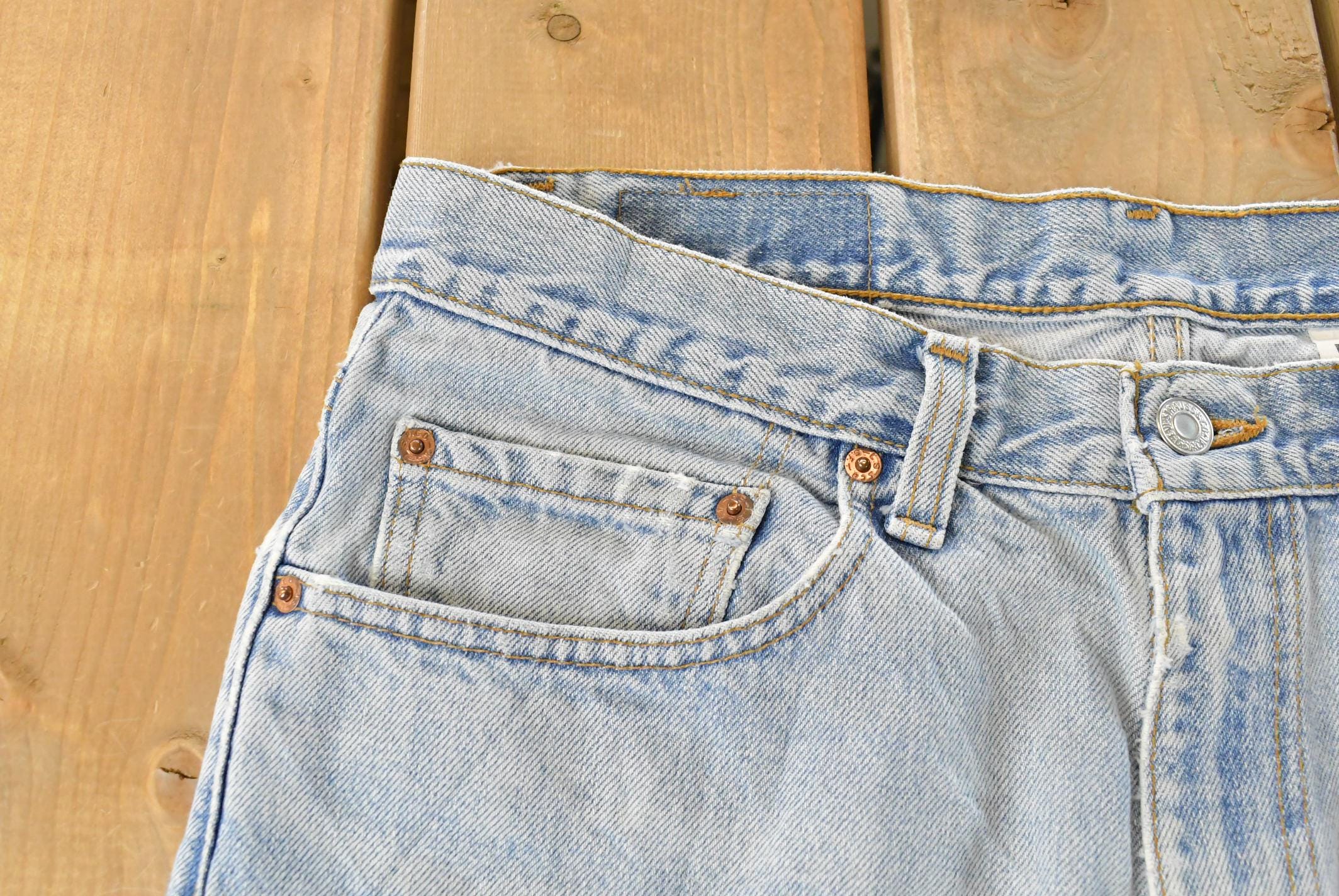 Vintage 1990s Levi's Distressed 550 Relaxed Fit Denim Jeans Men's 33 x 33 / 90s Levi's / Blown Out Sun Faded Jeans