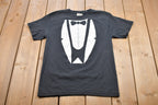 Vintage 1990s What Happens At Homecoming Graphic T-Shirt