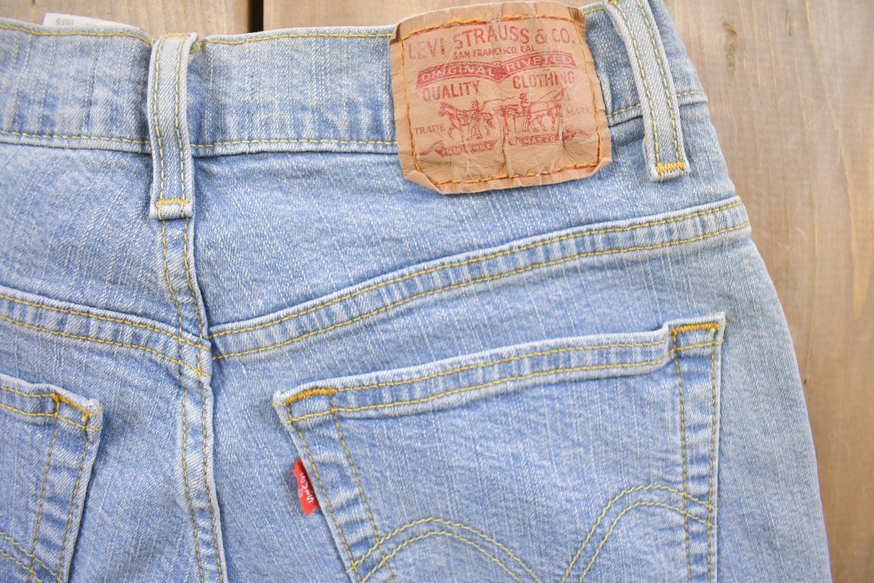 Vintage 1990s Levi's 550 Red Tab Denim Jeans Size 26 x 31 / Vintage Denim / Streetwear / Jeans / Made In USA / Vintage Levi's