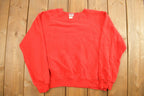 Vintage 1990s Blank Red Gearing Up Crewneck Sweatshirt