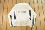 Vintage 1990s Nike Mini Swoosh Windbreaker Jacket Men's Large