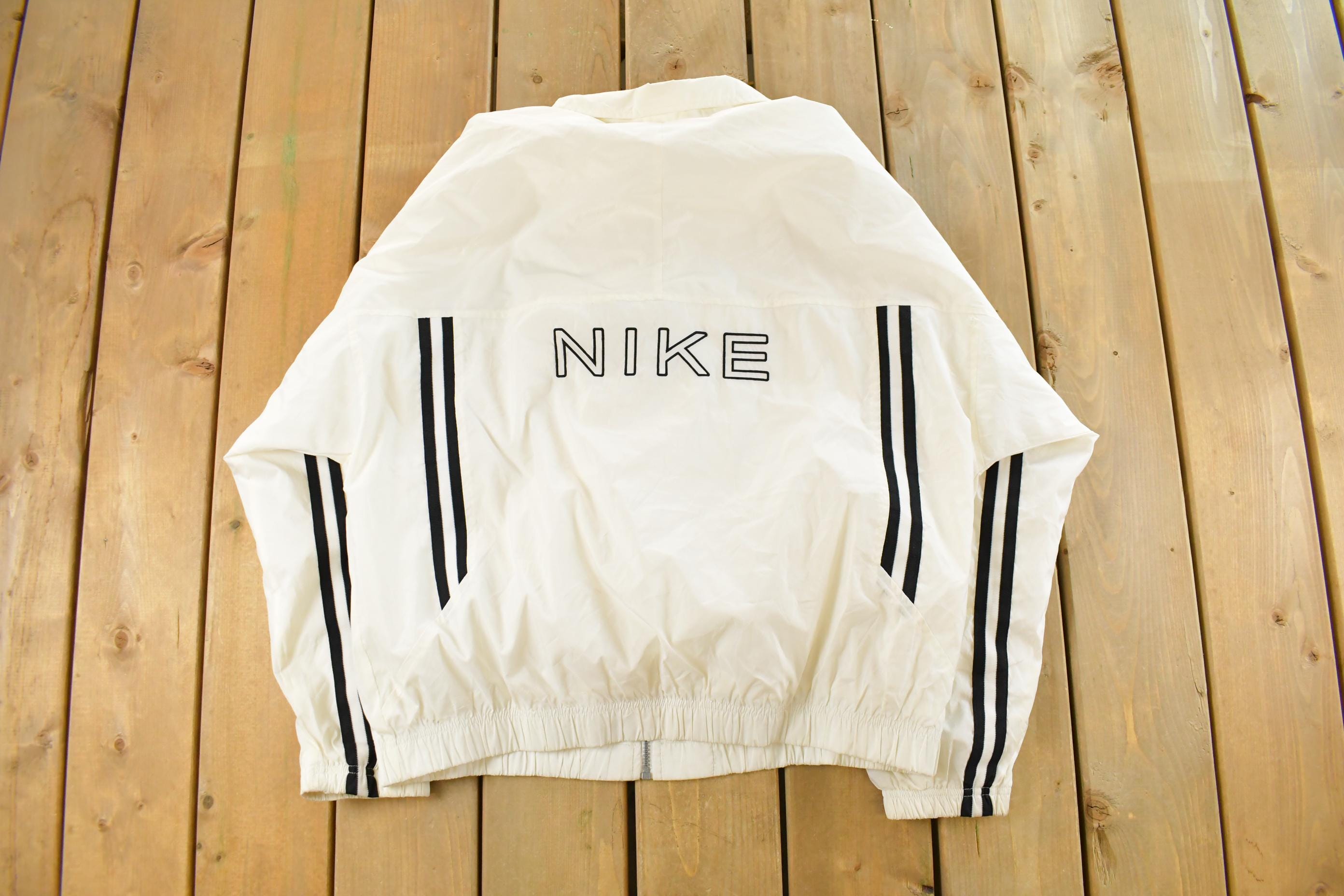 Vintage 1990s Nike Mini Swoosh Windbreaker Jacket Men's Large