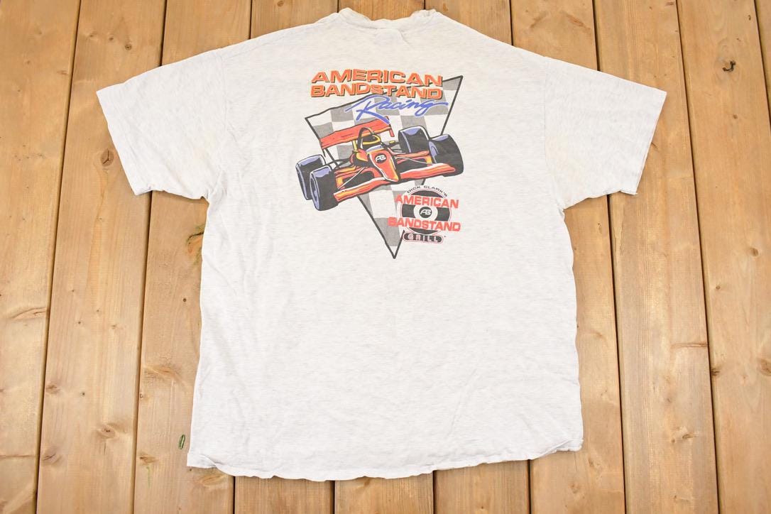 Vintage 1990s American Bandstand Racing Cartoon Graphic Print Souvenir F1 T-Shirt Men's L