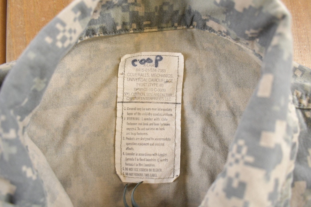 Vintage 1990s Universal Camouflage Jumpsuit Size 34x29