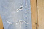 Vintage 1990s Levi's 550 Relaxed Fit Distressed Denim Jeans Men's 28 x 29 / 90s Levi's / Streetwear