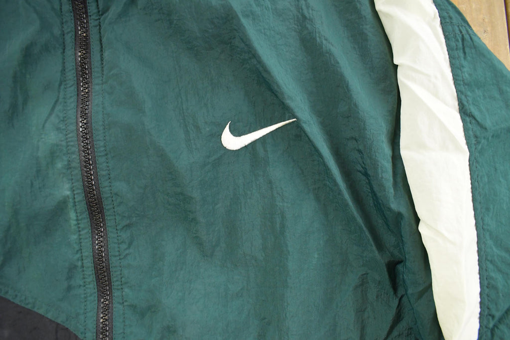 Vintage 1990s Nike Mini Swoosh Windbreaker Jacket Men's Medium