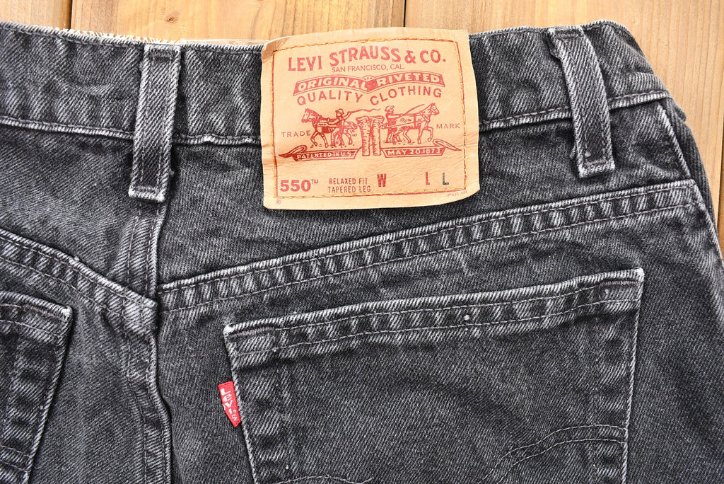 Vintage Early 1990s Levi's 550 Relaxed Tapered Faded Black Jeans