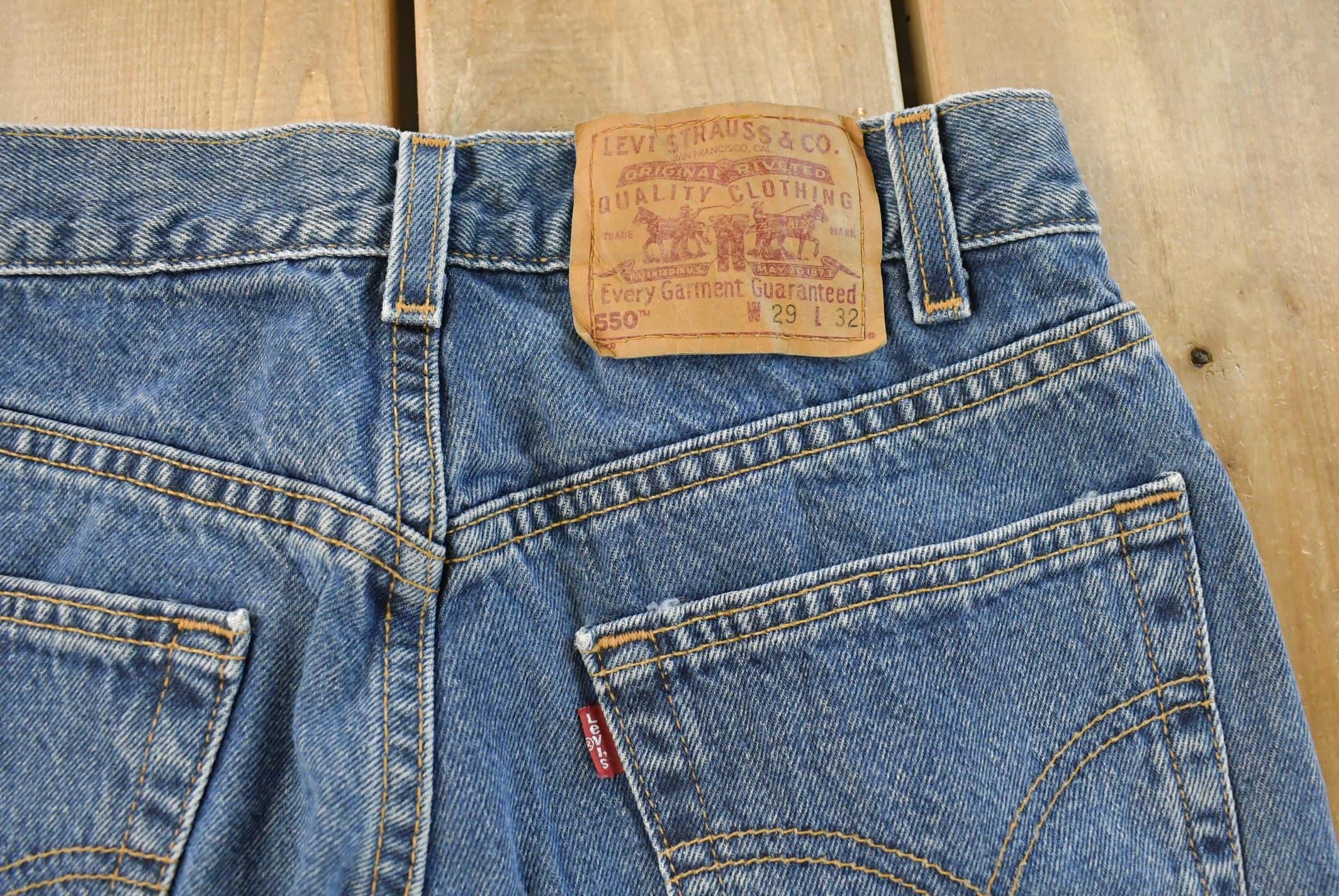 Vintage 1990s Levi's 550 Relaxed Fit Denim Jeans Men's 28 x 31 / 90s Levi's / Streetwear / Made in USA