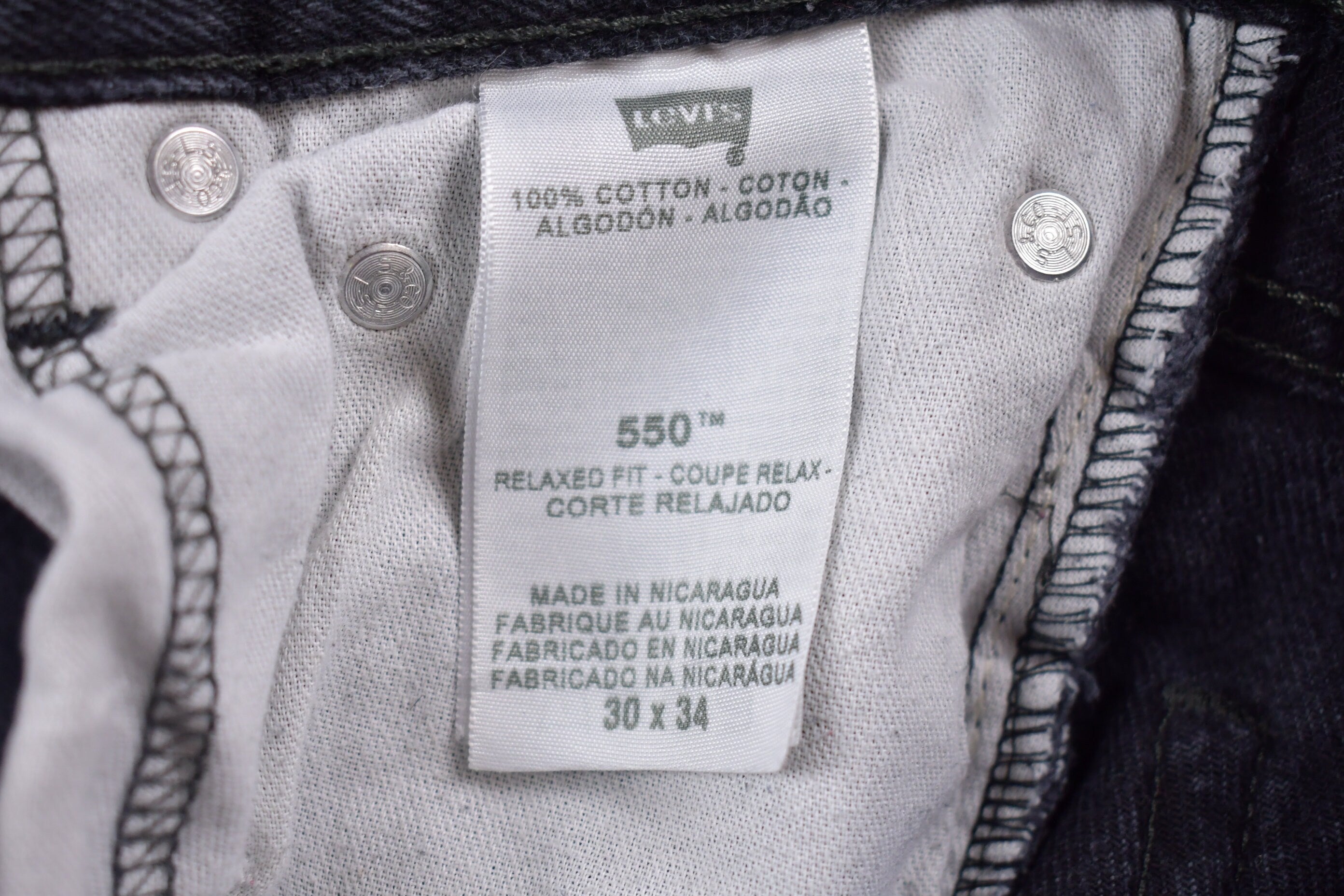 Vintage 1990s Levi's Distressed 550 Red Tab Jeans Size 30 x 32