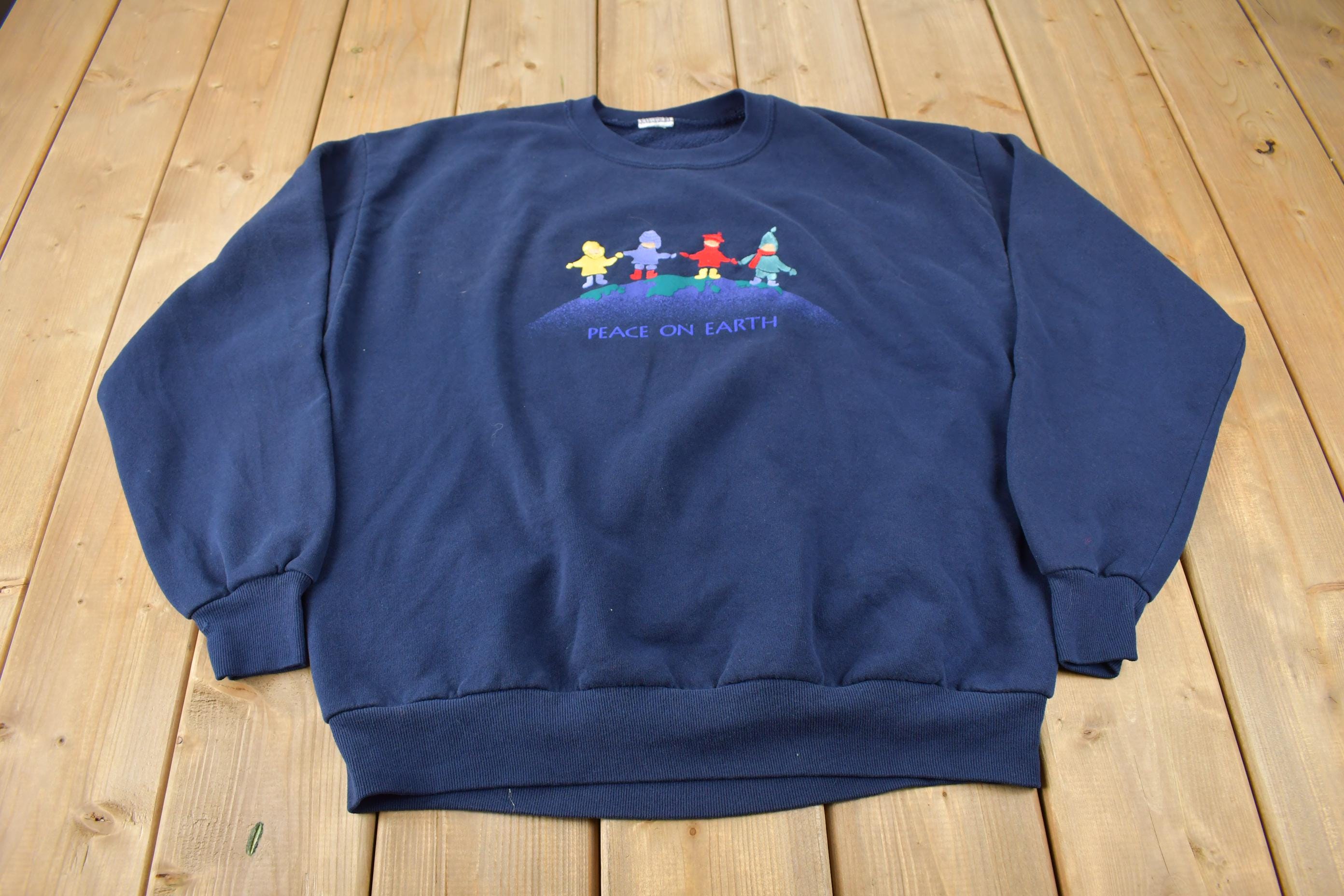 Vintage 1990s Peace On Earth Embroidered Crewneck Sweatshirt Made In USA