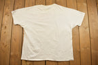 Vintage 1990s USA Atlanta Olympics Champion Graphic T Shirt