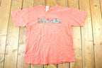 Vintage 1990s Black Hills Floral Hummingbird Souvenir T-Shirt Womens Large