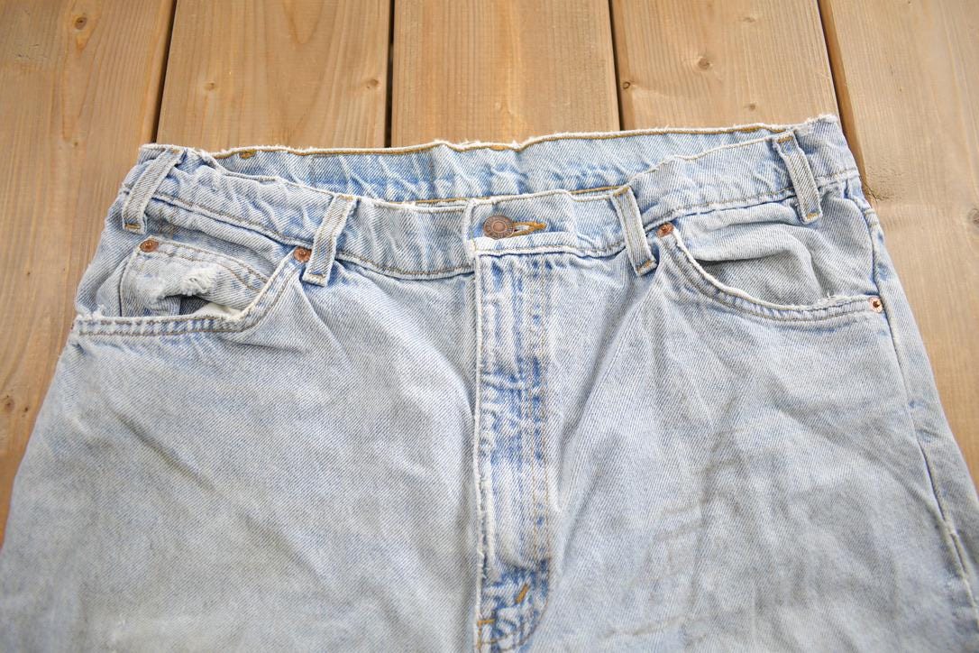 Vintage 1990s Levi's 550 Orange Tab Jeans Size 36x34