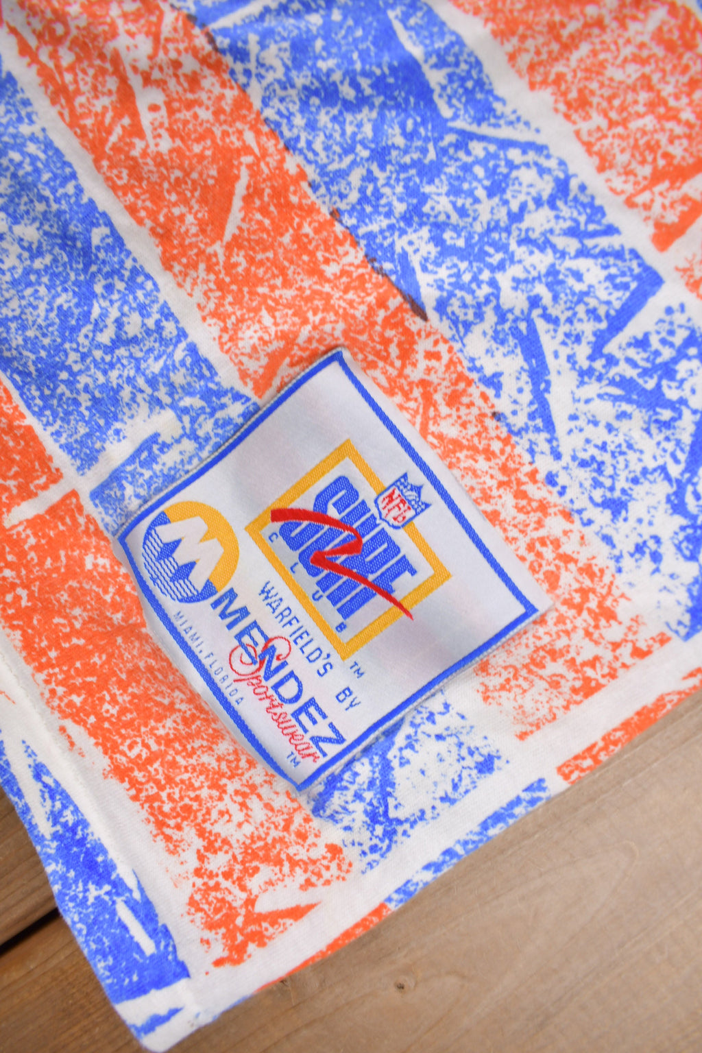 Vintage 1990s Denver Broncos NFL Football All Over Print Graphic T-Shirt Made In USA