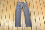 Vintage 1990s Levi Strauss 501 Red Tab Light Wash Black Denim Jeans Size 30 x 30