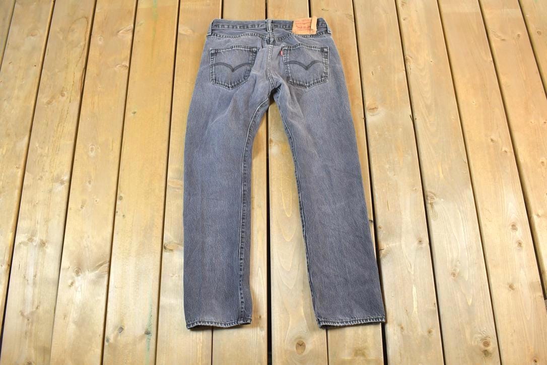 Vintage 1990s Levi Strauss 501 Red Tab Light Wash Black Denim Jeans Size 30 x 30