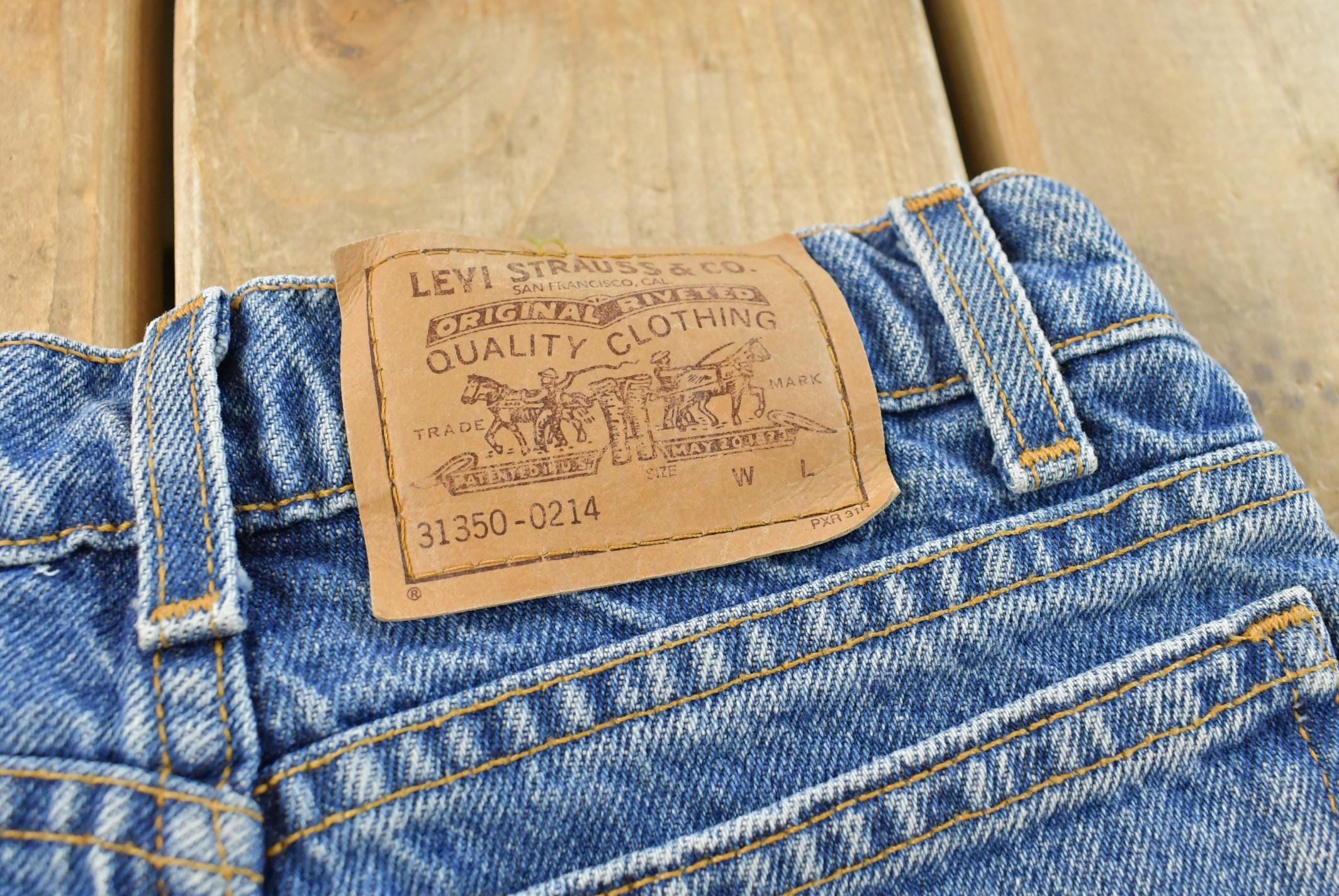 Vintage 1990s Levi's 550 Regular Fit Denim Blue Jeans Size 22 x 24.5 / 90s Levi's / Distressed Sun Faded Jeans / Streetwear