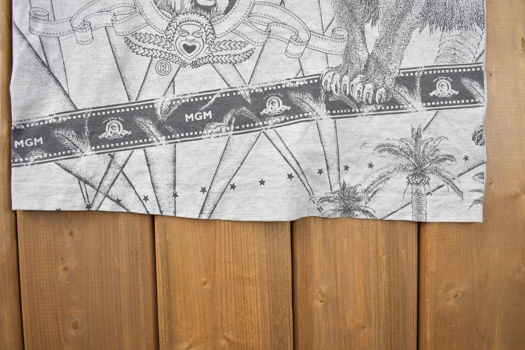 Vintage 1990s Metro Goldwyn Mayer Graphic All Over Print T Shirt