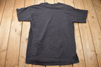 Vintage 1990s Starter Philadelphia Flyers NHL Graphic T-Shirt