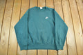 Vintage 1990s Nike Embroidered Mini Swoosh Crewneck Sweatshirt Men's XL