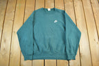 Vintage 1990s Nike Embroidered Mini Swoosh Crewneck Sweatshirt Men's XL