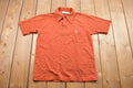 Vintage 1990s Grand Slam Munsingwear Button Up Collar Pocket T-Shirt