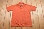 Vintage 1990s Grand Slam Munsingwear Button Up Collar Pocket T-Shirt