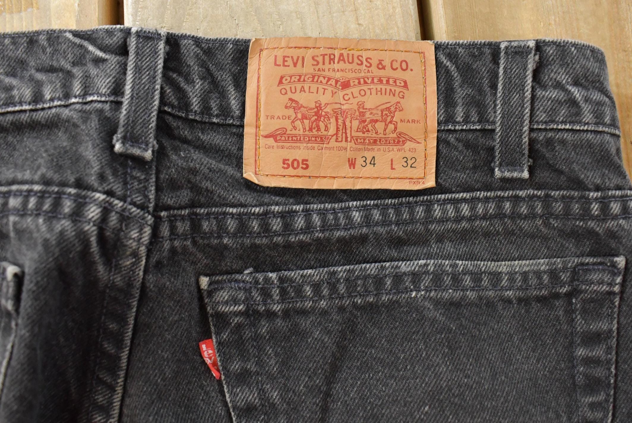 Vintage 1990s Levi's 505 Regular Fit Denim Jeans Men's 33 x 31 / 90s Levi's / Distressed Sun Faded Jeans