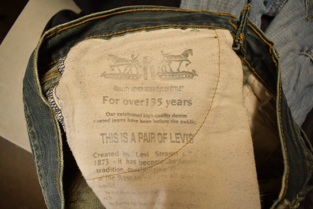 Vintage 1990s Levi's 521 Distressed Jeans Size 29x32