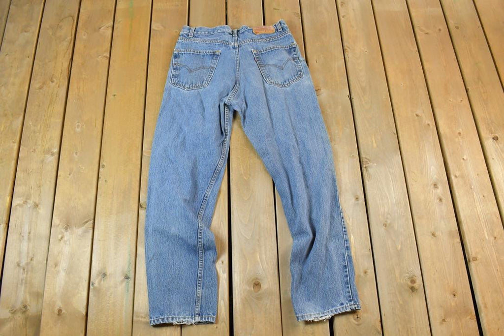 Vintage 1990s Levi Strauss Distressed Red Tab 550 Denim Jeans Size 33 x 32